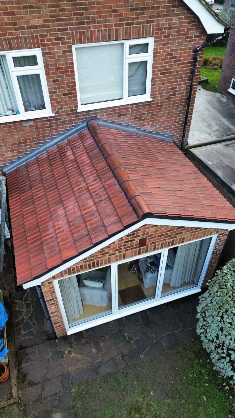 Conservatory with new pitched tile roof extension — builders Richmond Surrey