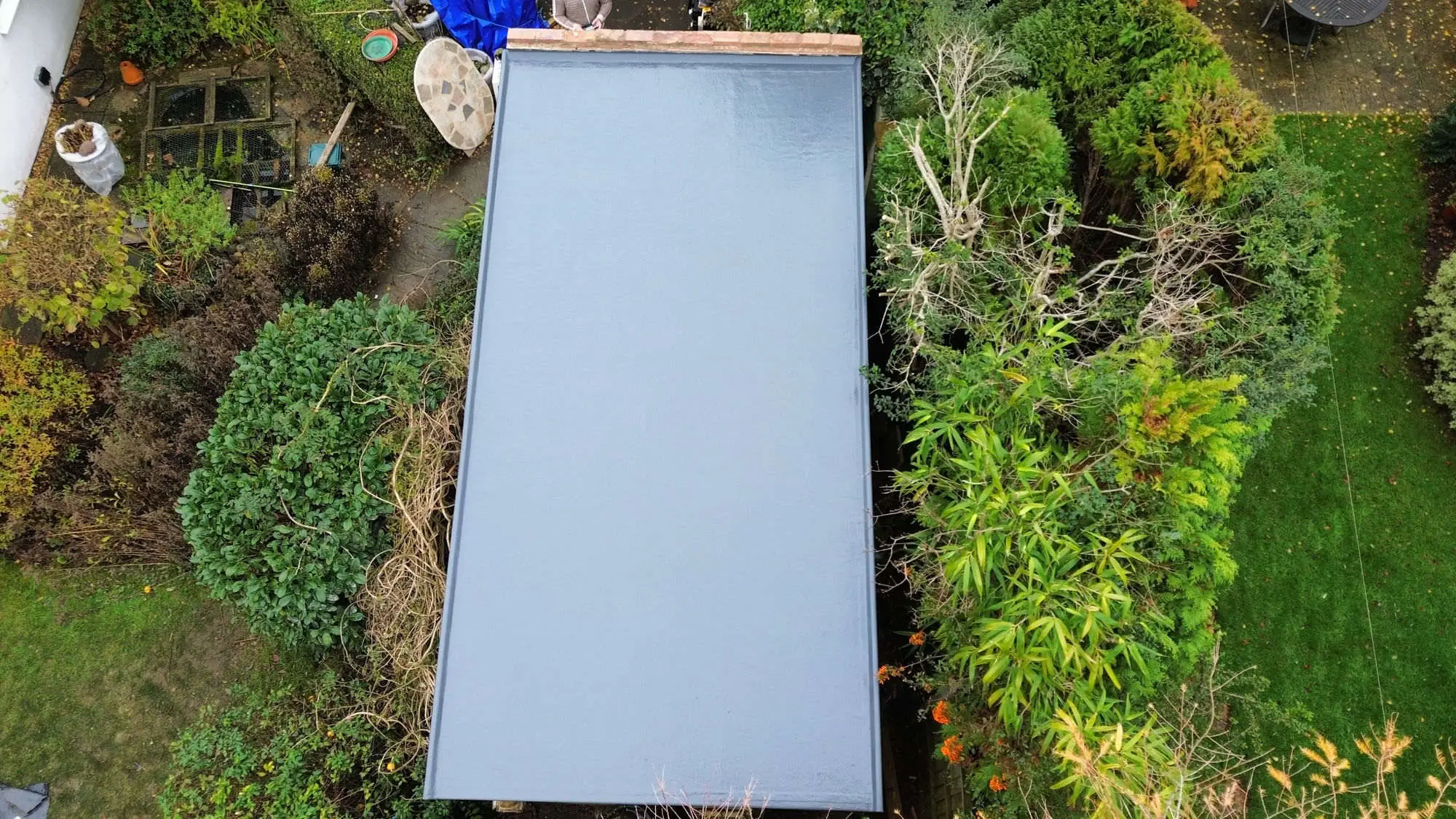 Fibreglass flat roof installation aerial view — flat roof specialists Surrey