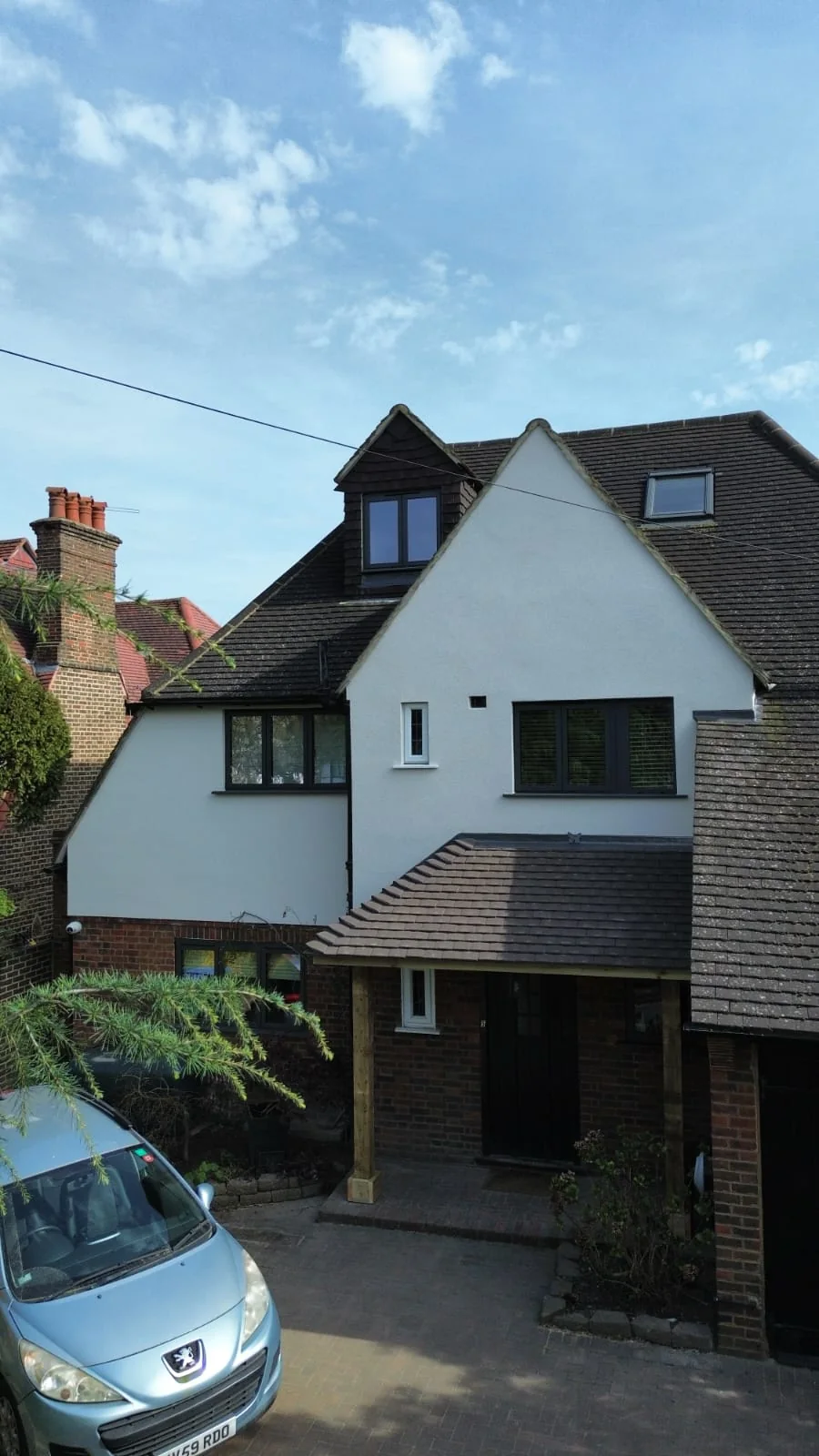 House extension with rendered finish — extension builders Richmond Surrey